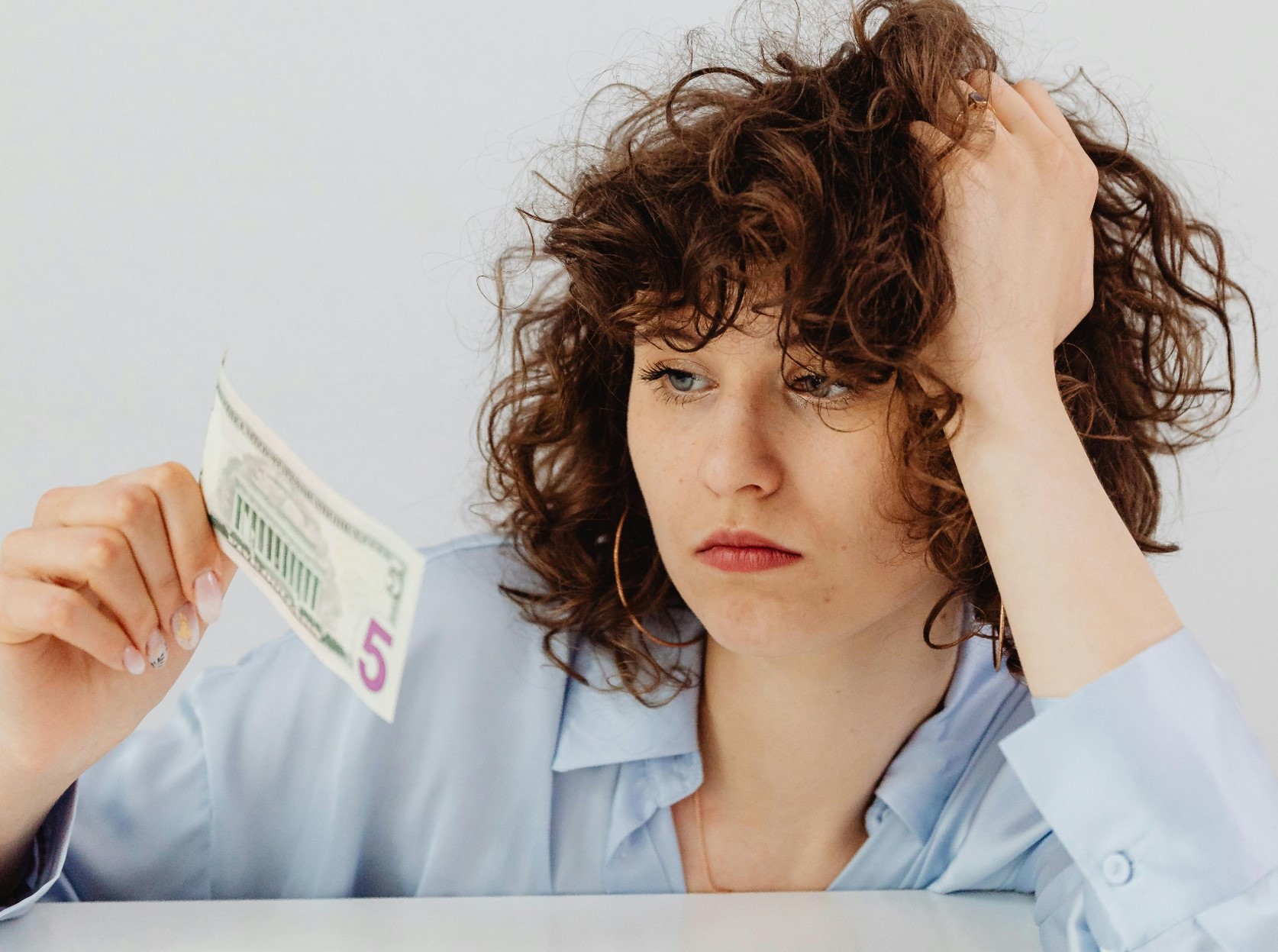 Financial Worries, Health Complaints, and Career Exploration: The Role of Action Crises